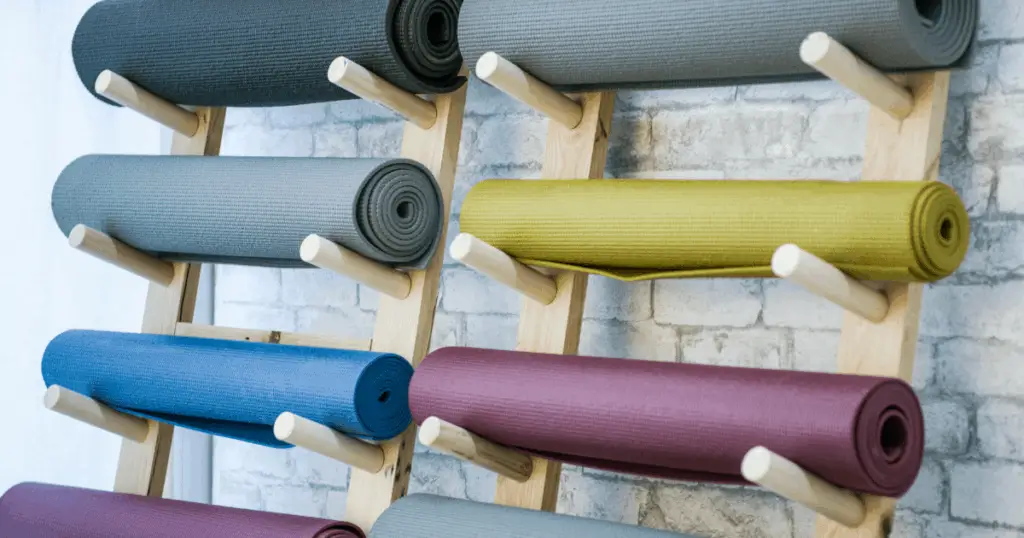 an image of a rack filled with the best yoga mat